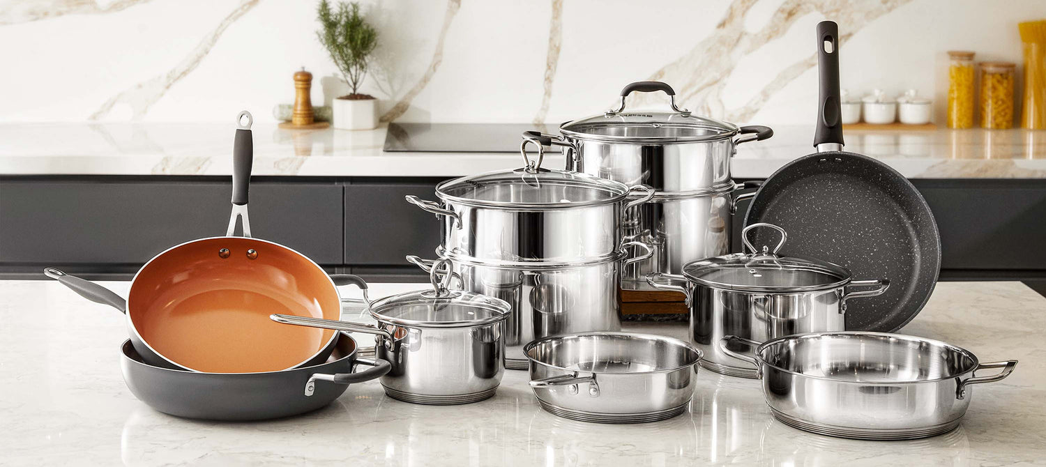 Sunhouse Set of stainless steel cookware on a kitchen counter